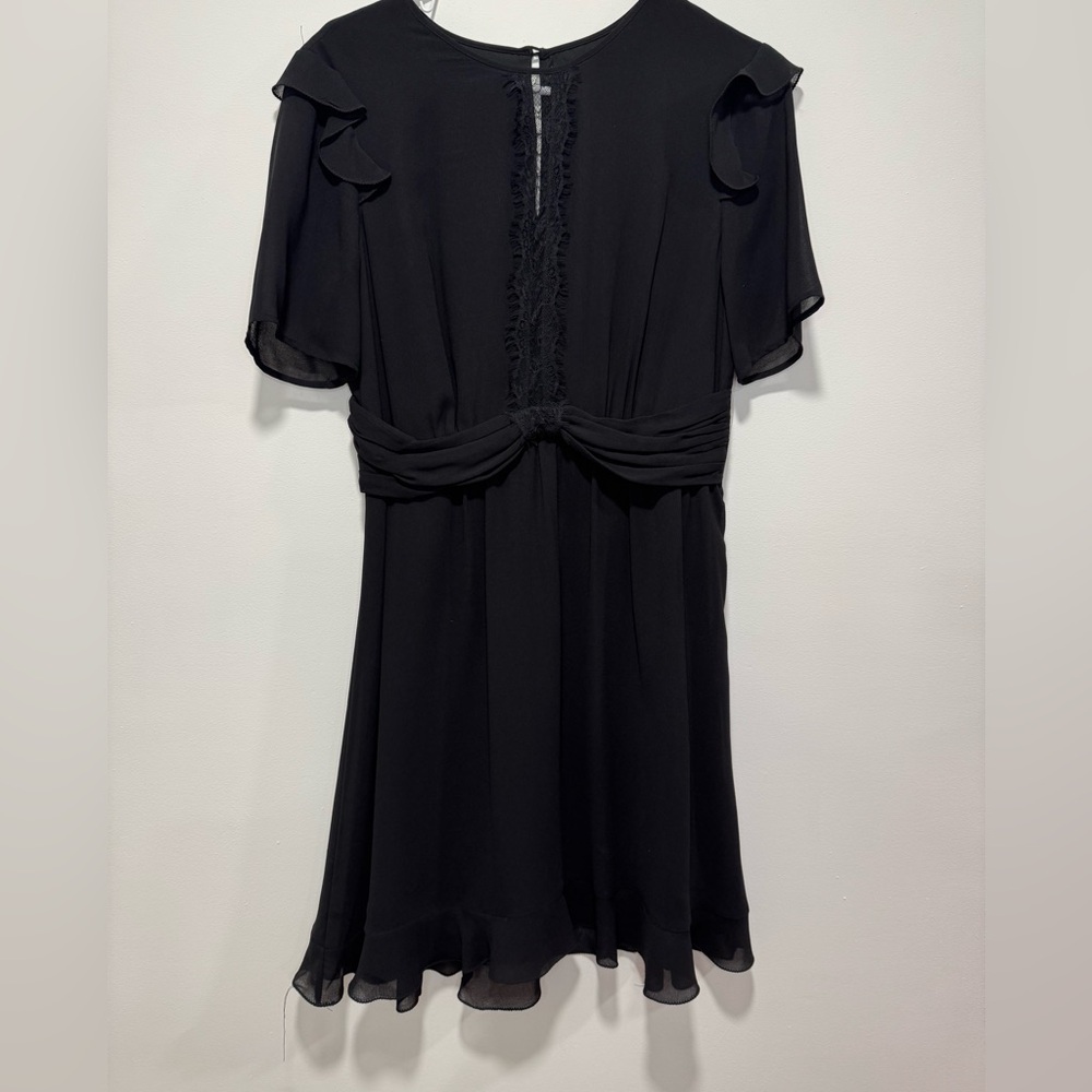 Elegant Black Mini Dress with Ruffle Accents